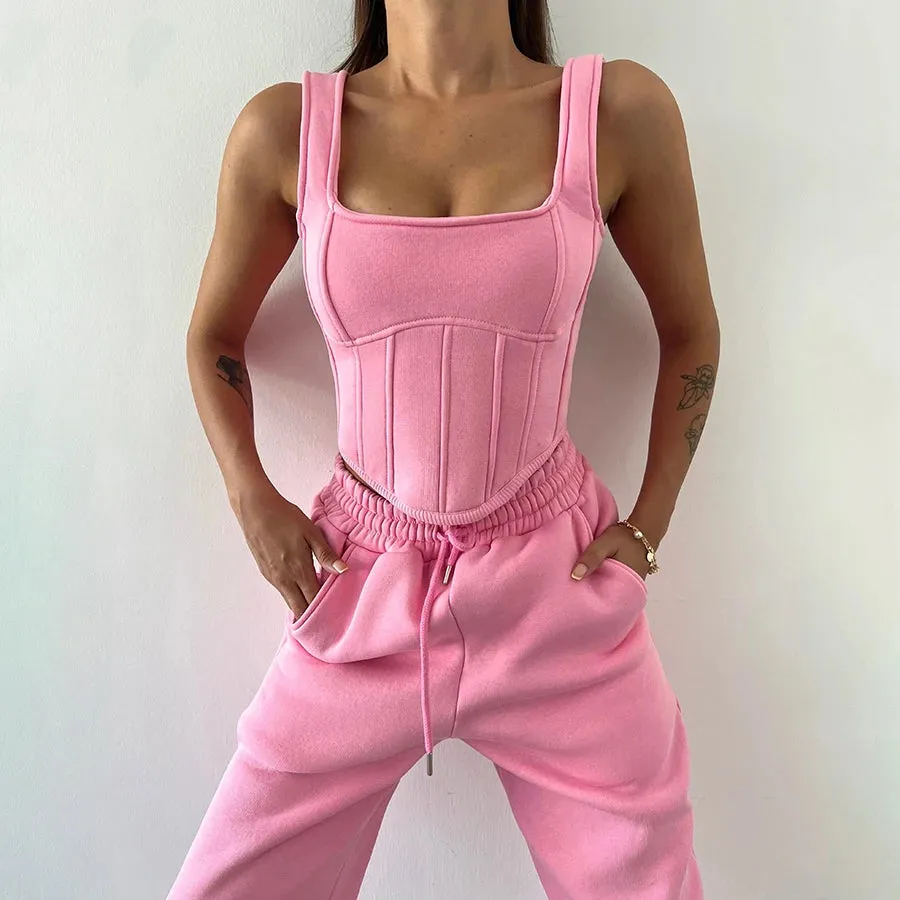 Sure! Here’s an optimized title for your e-commerce product:

Chic Womens 3-Piece Jogger Set: Classic Tank Top, Long Sleeve Crop Top & Stylish Bandage Pants for Trendy Streetwear

This title adds modifiers to highlight the style, functionality, and fashion appeal of the product.